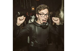 A man dressed in a scuba diver costume at a halloween party