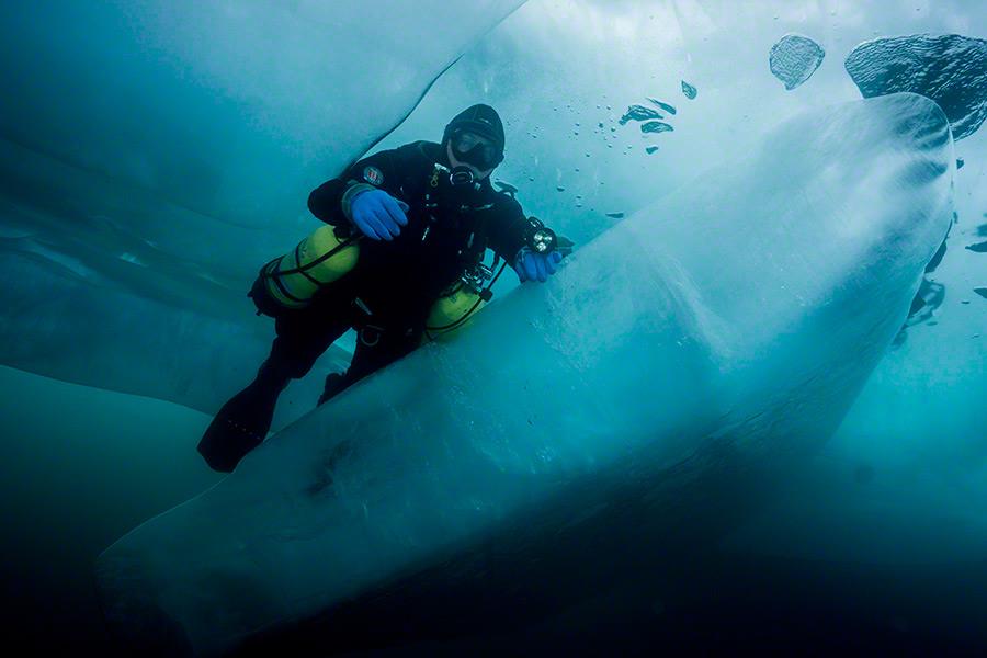 Diver using a sidemount diving setup underwater