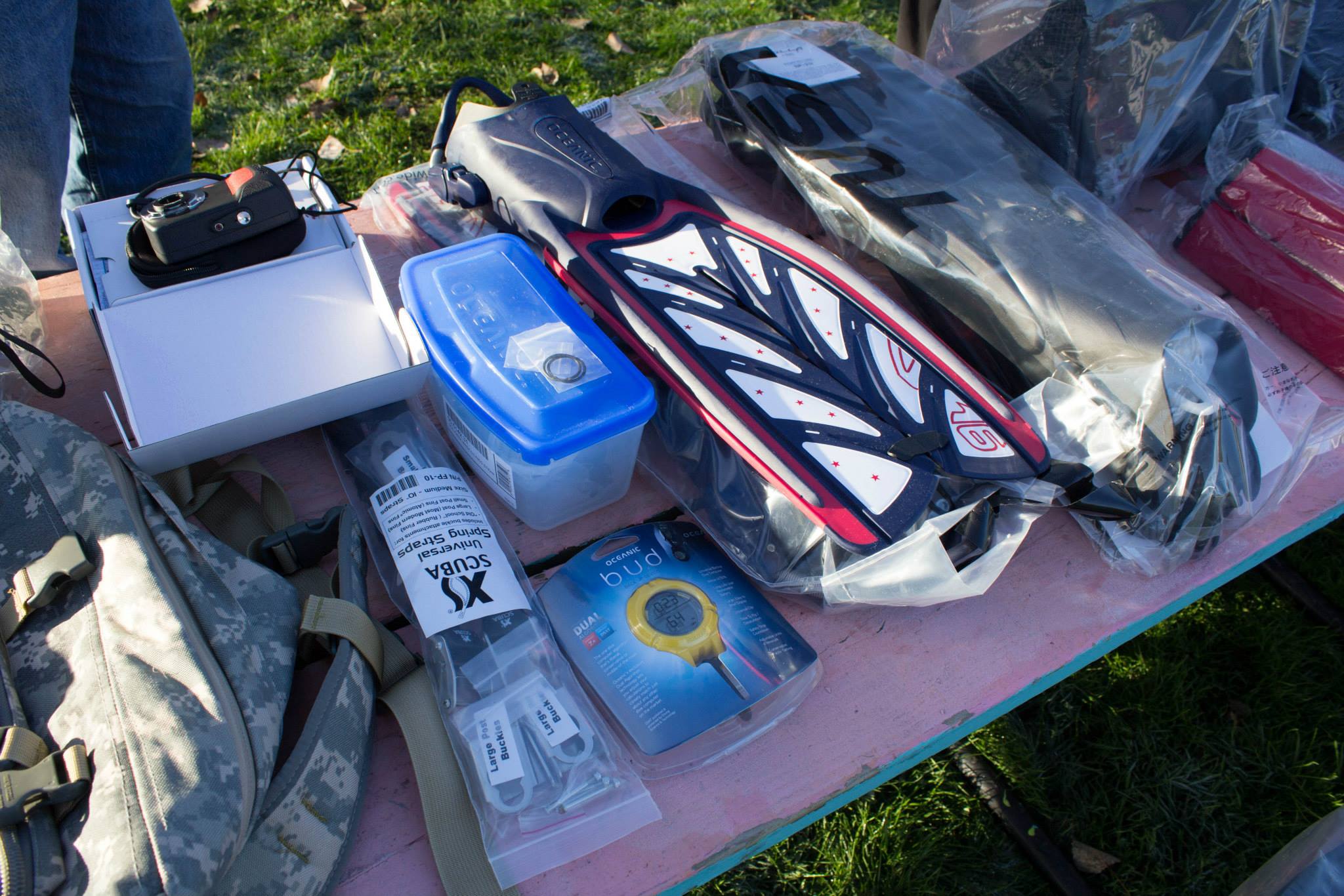 Fins and straps laid out on a table