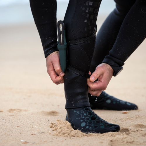 A dive knife in a boot sheath
