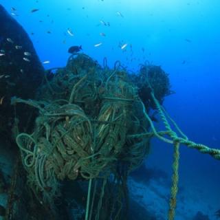 Discarded fishing net at the bottom of a body of water