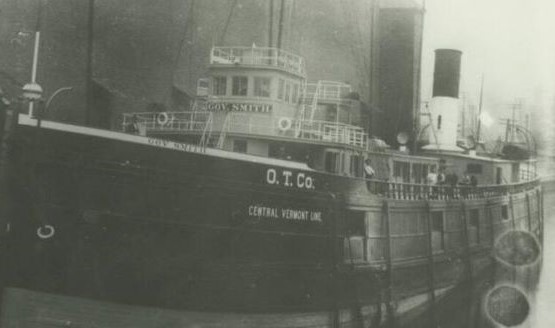 A historical, black and white photo of the Central Vermont line at port